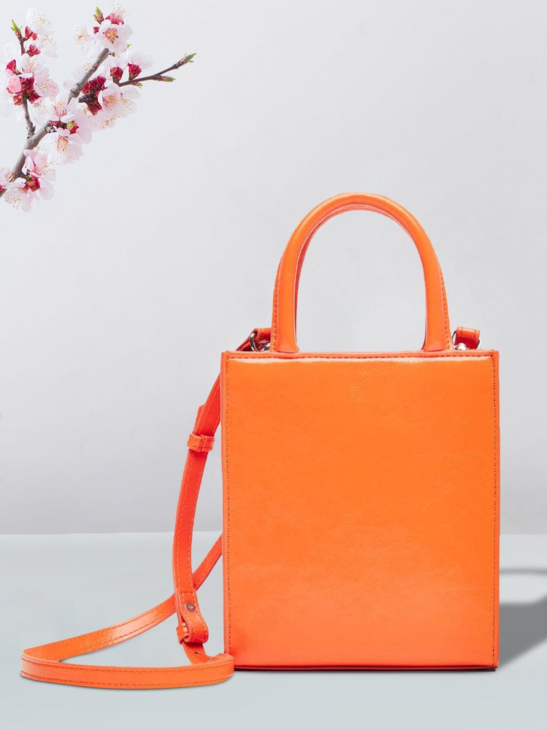 3079b58a-02b7-48a6-b8c6-9aeaafa2977c1668512666870-MANGO-Orange-Solid-Structured-Handheld-Bag-with-Detachable-S-1